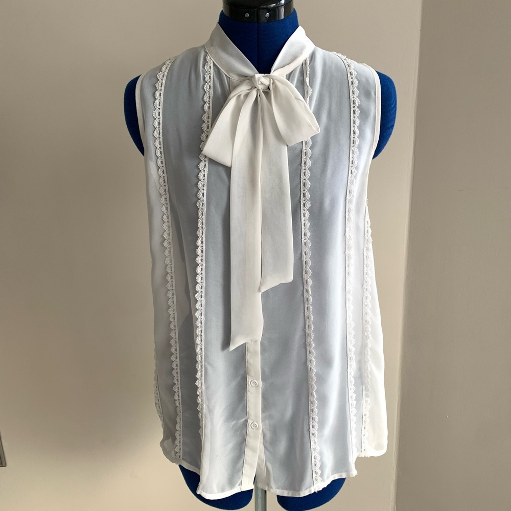 White Victorian tie sleeveless blouse